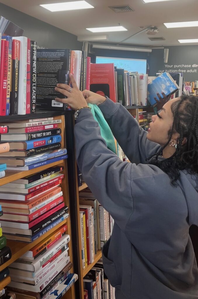 Bookstore volunteers stocking shelves